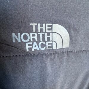 The North Face women’s black  quilted zip up hoodie size XS